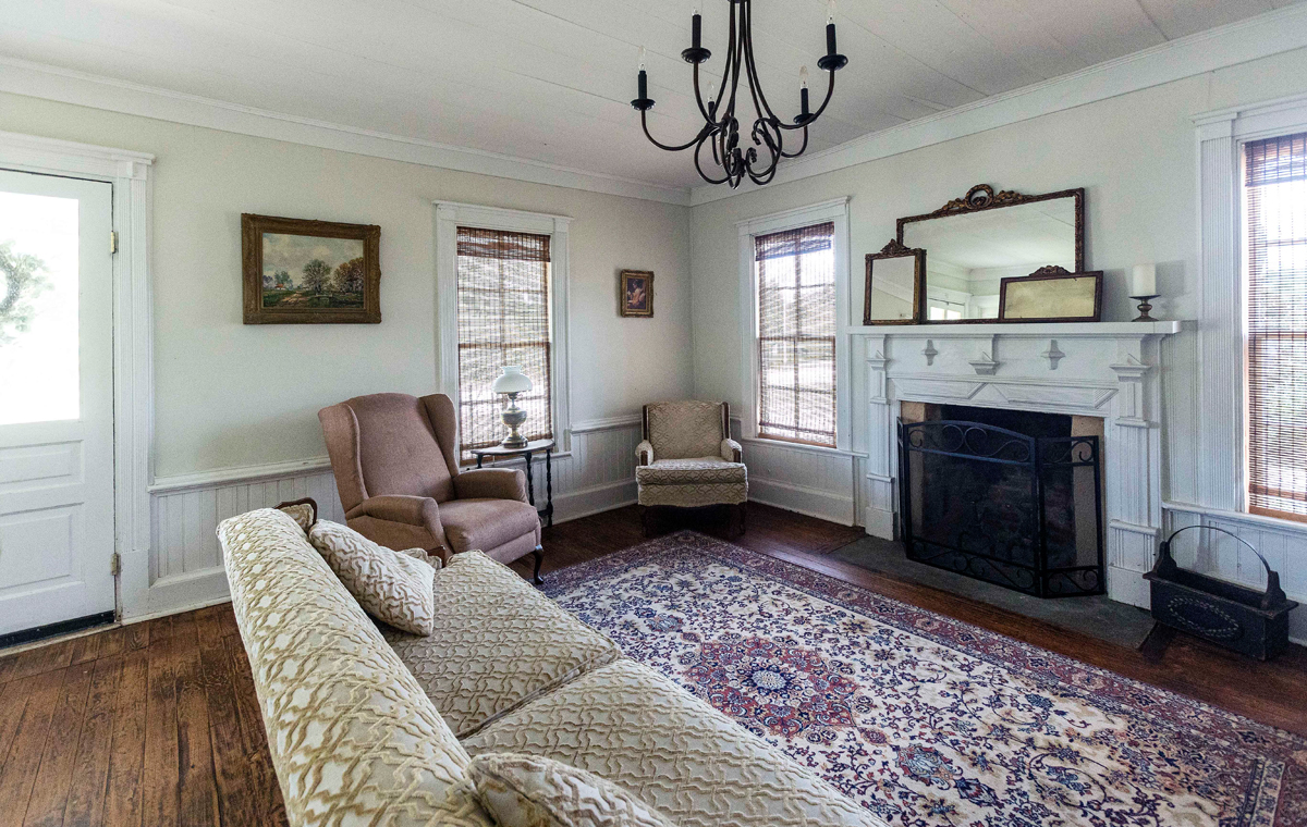 Mantles and wood-burning fireplaces remain from the original home, built around 1805.