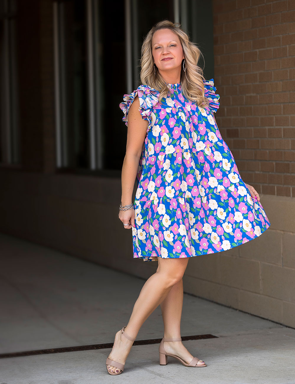 On model Jodi Stevens:
Floral tiered dress, $45.99
