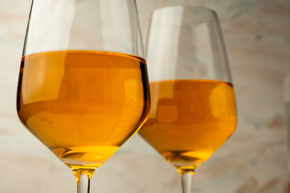 two glasses of orange wine